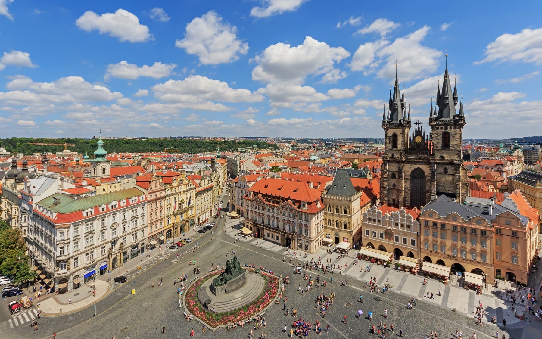 Old Town Square in Prague, with red roofs and the Church of Our Lady before Týn