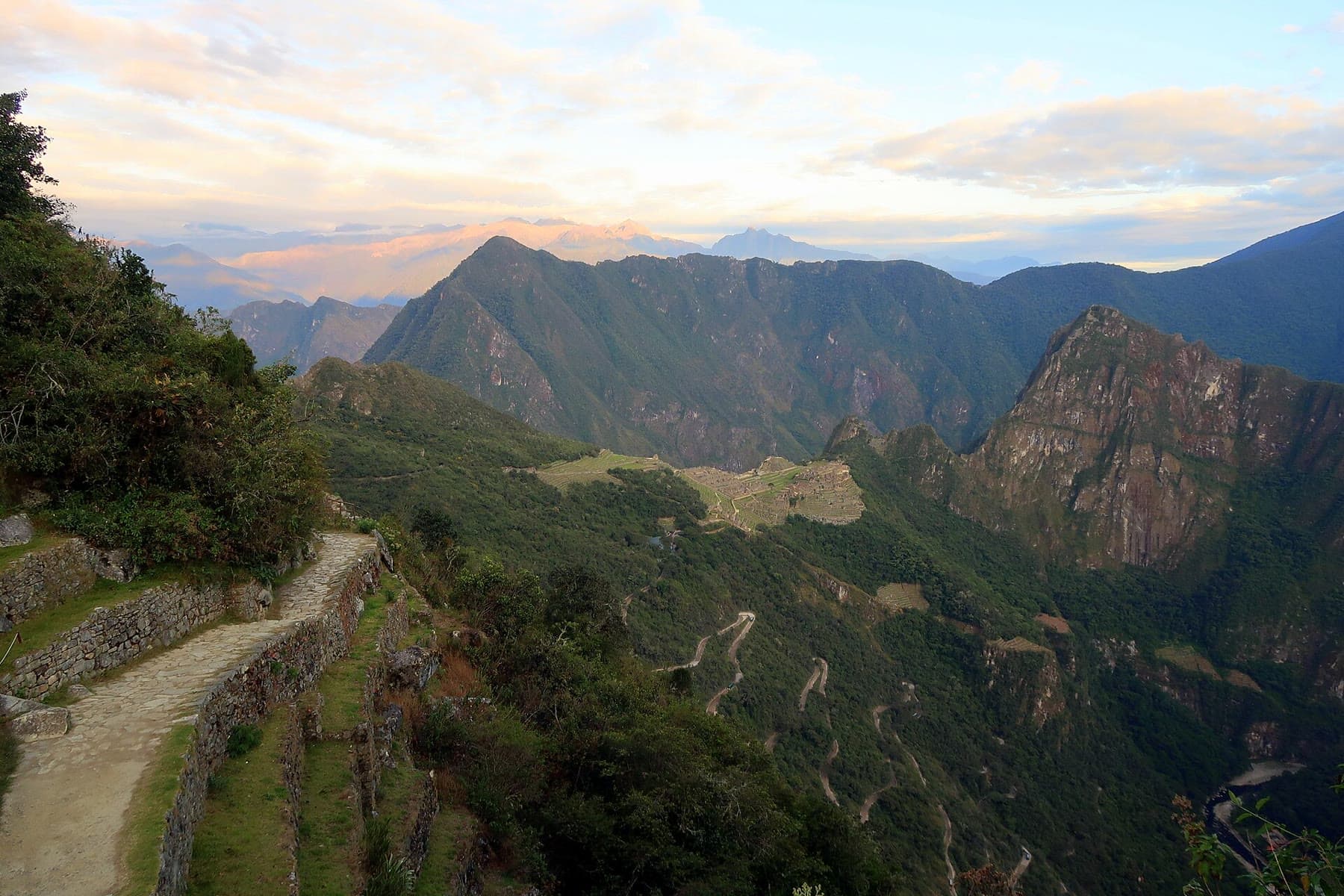 Machu Picchu in the valley below the Inca Trail at sunrise