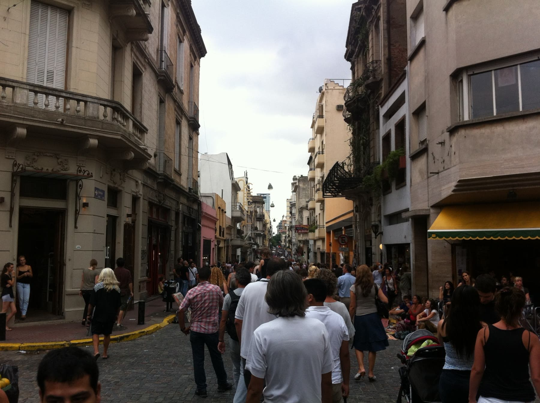 A crowded pedestrian street in San Telmo, Buenos Aires