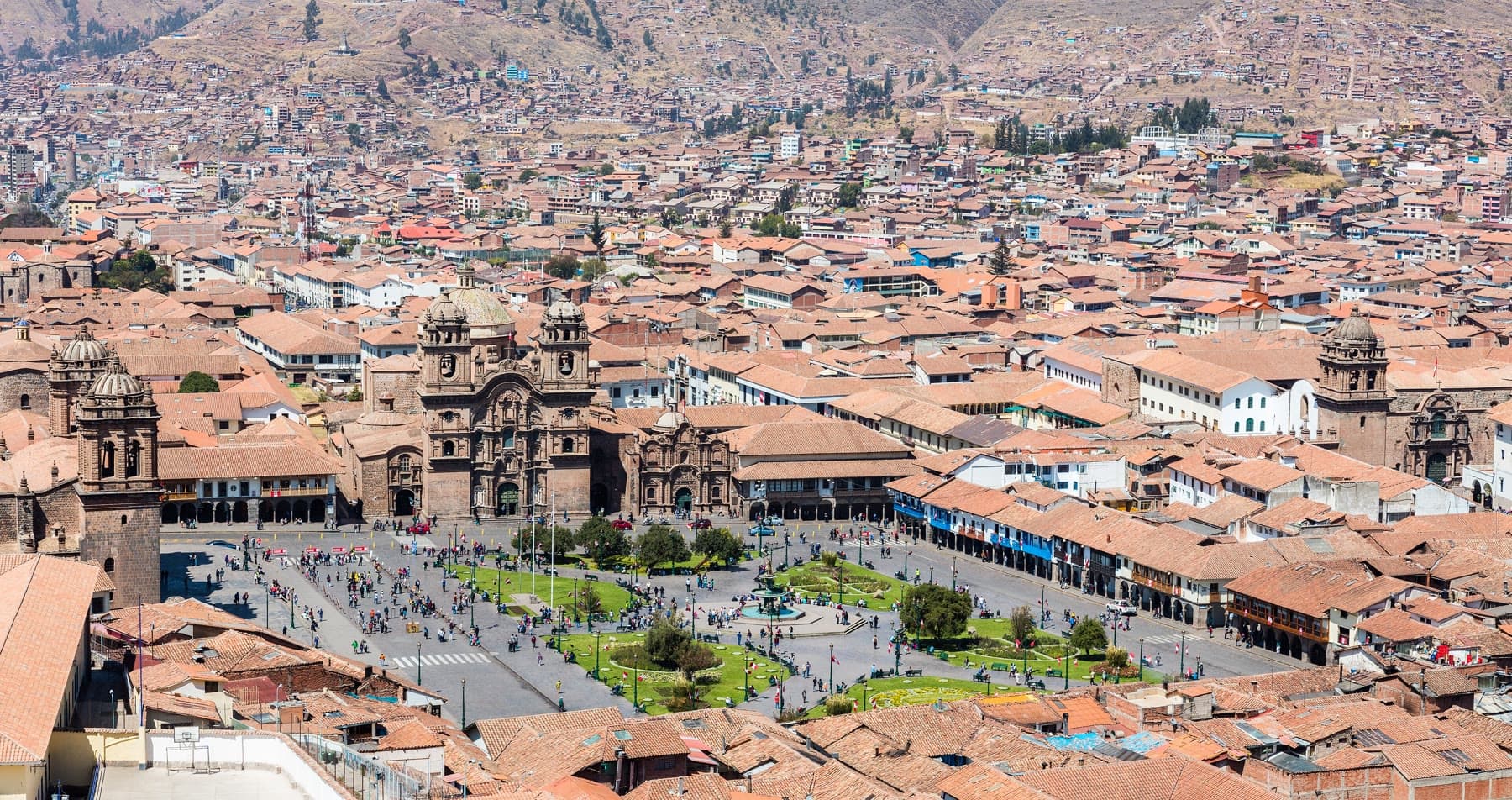 The historic center of Cusco with the Andes beyond