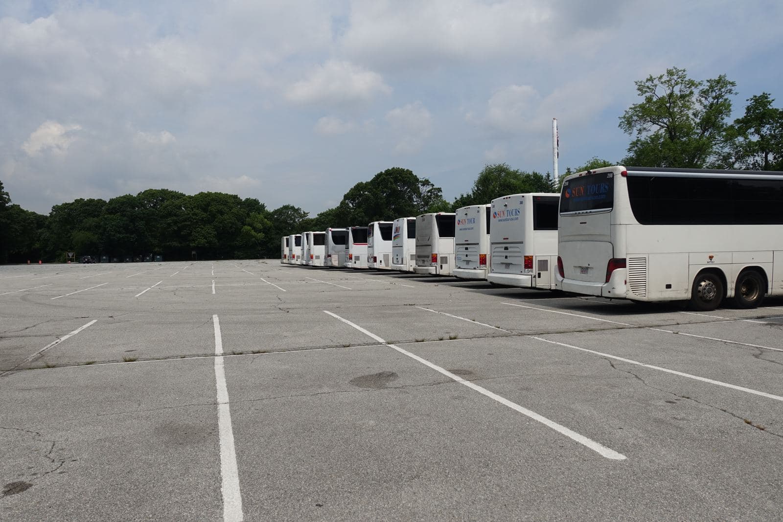 Richmond Tours motorcoaches lined up in a parking lot