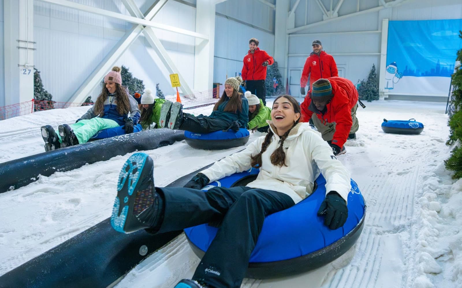 Students snow tubing indoors at Big Snow American Dream