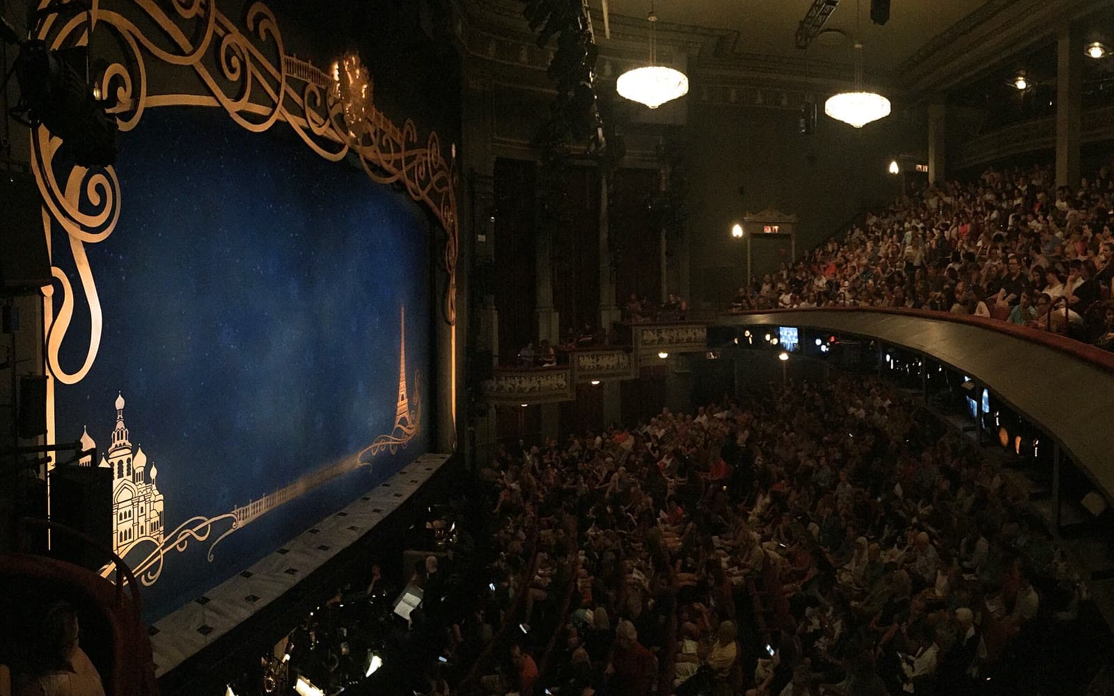 The audience and stage inside a Broadway theatre