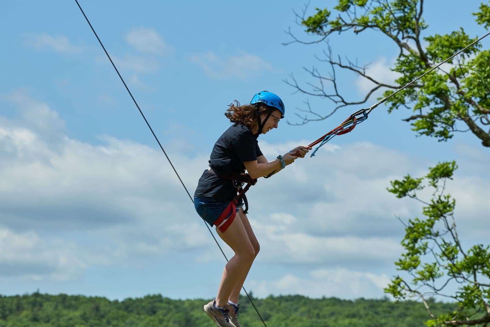 A student on the zip line at Pocono Valley Resort