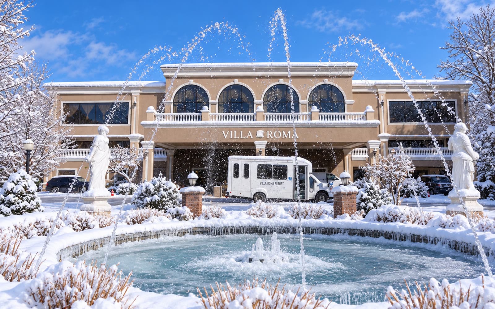 The snowy fountain in front of Villa Roma Resort